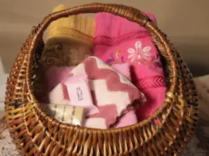 Pink and yellow towel, face hanky, pink face/hand towel, 5 pcs clip and hamper basket