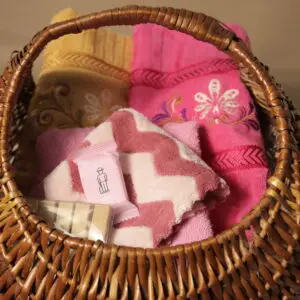 Pink and yellow towel, face hanky, pink face/hand towel, 5 pcs clip and hamper basket