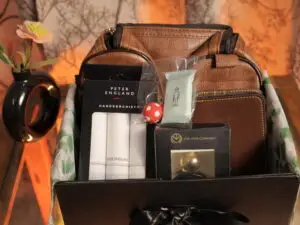 hanky kit, perfume, wallet, bag, keychain and compressed face towel