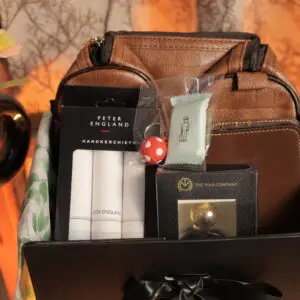 hanky kit, perfume, wallet, bag, keychain and compressed face towel